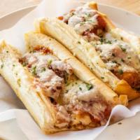 Chicken Parm Sub · Chicken with marinara sauce, provolone cheese and Parmesan cheese on top.