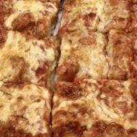 Buffalo Chicken Ranch Pizza (Large) · Buffalo breaded chicken, mozzarella, topped with ranch dressing (no pizza sauce).