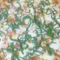 Margarita Pizza (Large) · Fresh mozzarella cheese, fresh basil, fresh tomato (no pizza sauce).