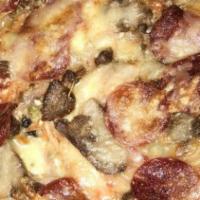 Meat Lovers Pizza (Large) · Pepperoni, sausage, hamburger, ham and bacon.