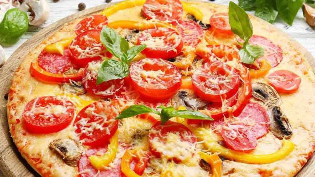 Margarita Pizza (Medium) · Fresh mozzarella cheese, fresh basil, fresh tomato (no pizza sauce).