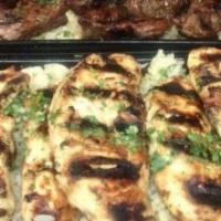 Chicken Kabob Plate · Sautéed with mushrooms, tomato & onions. Served with rice & side salad.