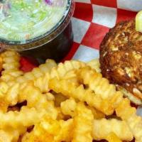 1 Crab Cake Special · 1 jumbo lump Maryland crab cake served with hand cut french fries & 5 oz. of our signature c...