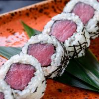 Thunder Roll · Spicy tuna inside, topped with pepper tuna.