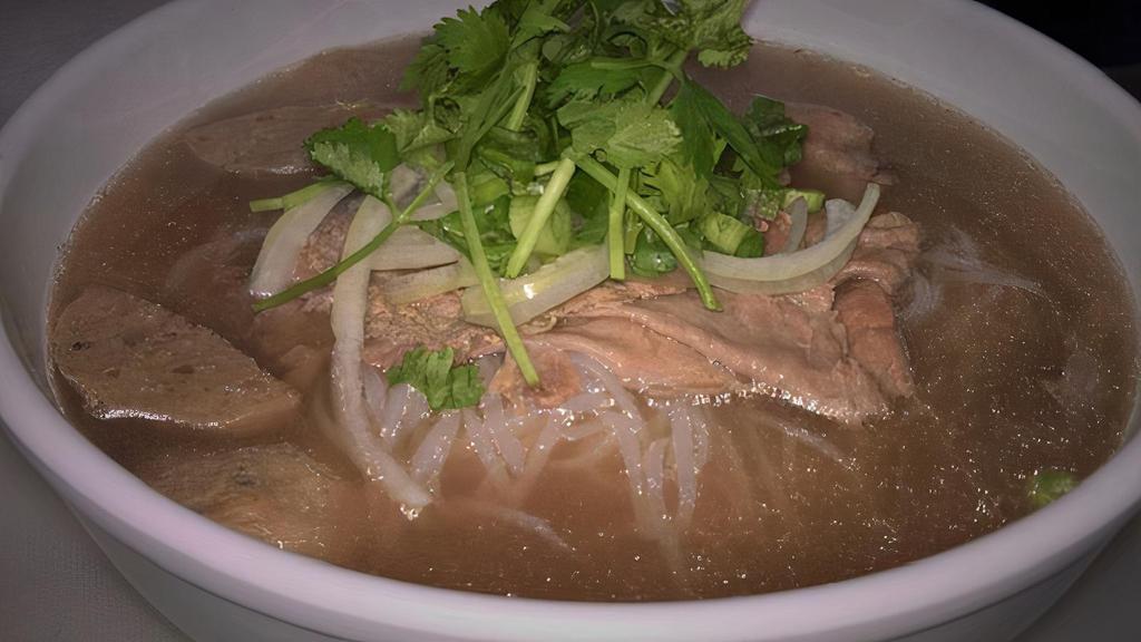 Pho Beef · straight cut rice noodle, Angus eye round, beef meatball, onion, straight cut rice noodle, cilantro, basil, bean sprout, lime, jalapeño. Including Hanoi style cruller for dipping.