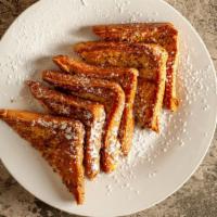 French Toast · Three slices of Texas toast. Served with butter and syrup.
