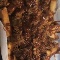 Bbq Pulled Pork Fries · BBQ pulled pork over fries.