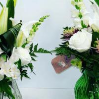 Spring Specials  · Assorted flowers, glass vase, flower bag, balloon, and a special note for that  special pers...