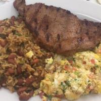 Calentado Paisa · Scramble eggs with tomatoes and onions, rice and beans, grilled steak, arepa, cheese and cof...