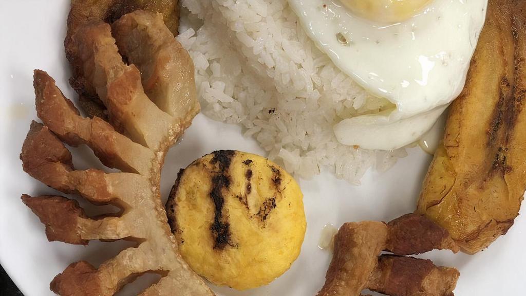 Frijoles Con Chicharrón · Beans, chicharrón, sweet plantains, fried egg and rice