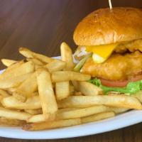 Fish Butty · lightly beer battered haddock, stacked on a brioche
bun with american cheese, lettuce, tomat...