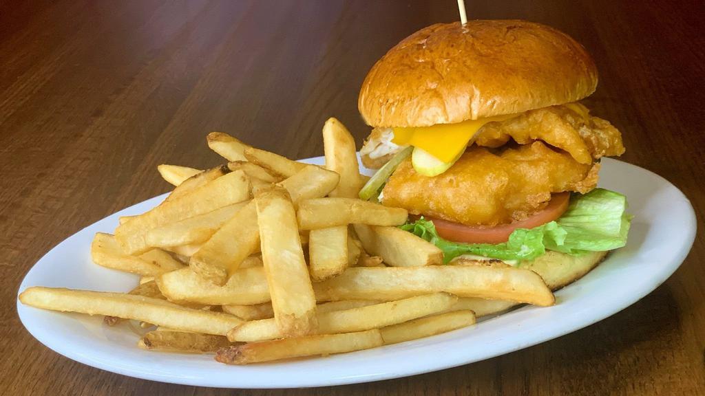 Fish Butty · lightly beer battered haddock, stacked on a brioche
bun with american cheese, lettuce, tomato, pickle &
house made tartar sauce.