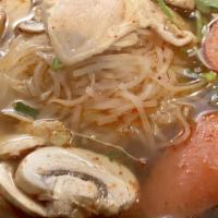 Tom Yum · Thai style hot and sour soup with a choice of chicken, shrimp or tofu with mushroom, lime ju...