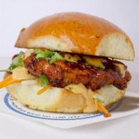 The Cluck Pao · brioche bun, famous crispy chicken / . house teriyaki glaze, cucumber+carrot slaw, scallions...