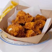 10Pc Cluck'N Nuggets · crispy, hand-breaded, boneless chicken bites seasoned to perfection / 1 sauce included
