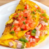 Western Omelette · tomatoes,onion,green peper,onion,ham,egg and cheese