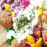 Salad Bowl · Build your own salad. select your choice of Shawarma or Yāfa Falafel then add toppings and d...