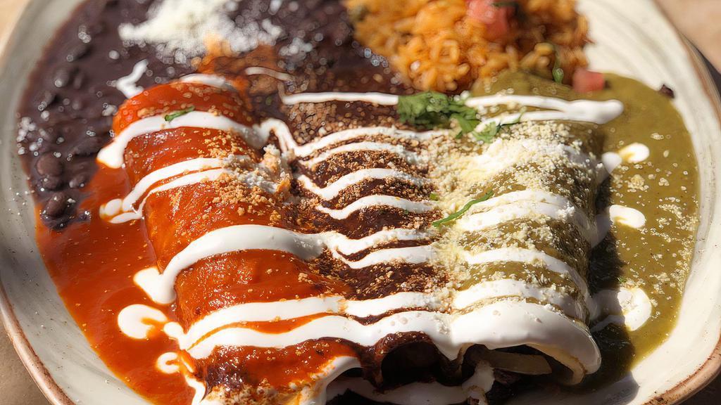 Enchiladas Tres Colores · Vegetarian and gluten-free. Three corn tortillas stuffed with cheese, topped with our homemade sauces: tomatillo, tomato, and mole. Served with Mexican rice and black beans.