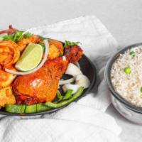 Special Tandoori · Combination platter of tandoori (chicken, shrimp, fish & lamb).