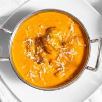 Goat Korma · A moghulai delight cardamoms flavored sweet and spicy curried Goat in cream, cashews and rai...