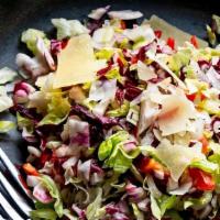 Chopped Italian Salad · Chopped romaine, radicchio, celery, red onions, pepperoncini peppers, cherry tomatoes, shave...