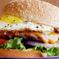 Breakfast Burger · LETTUCE, TOMATO, ONION, FRIED EGGS AND AMERICAN CHEESE ON A HAMBURGER BUN