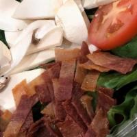 Spinach Salad · FRESH PICKED SPINACH LEAVES, SLICED MUSHROOMS, TOMATO, CROUTONS, HARD BOILED EGG, & CRISPY B...