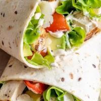 Chicken Caesar Wrap · GRILLED CHICKEN, PARMESAN CHEESE, ROMAINE LETTUCE, TOMATOES & CAESAR DRESSING. SERVED IN A F...