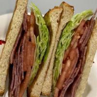 Turkey Bacon Blt · TURKEY BACON, LETTUCE & TOMATO. SERVED ON YOUR CHOICE BREAD TOASTED.