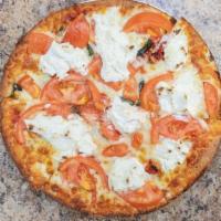 Margarita Specialty Pizza · A mixture of both sun-dried tomatoes and freshly sliced tomatoes with ricotta cheese, and fr...