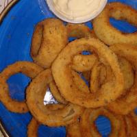 A17 Home-Made Crispy Onion Rings · With citrus honey mustard dipping sauce.