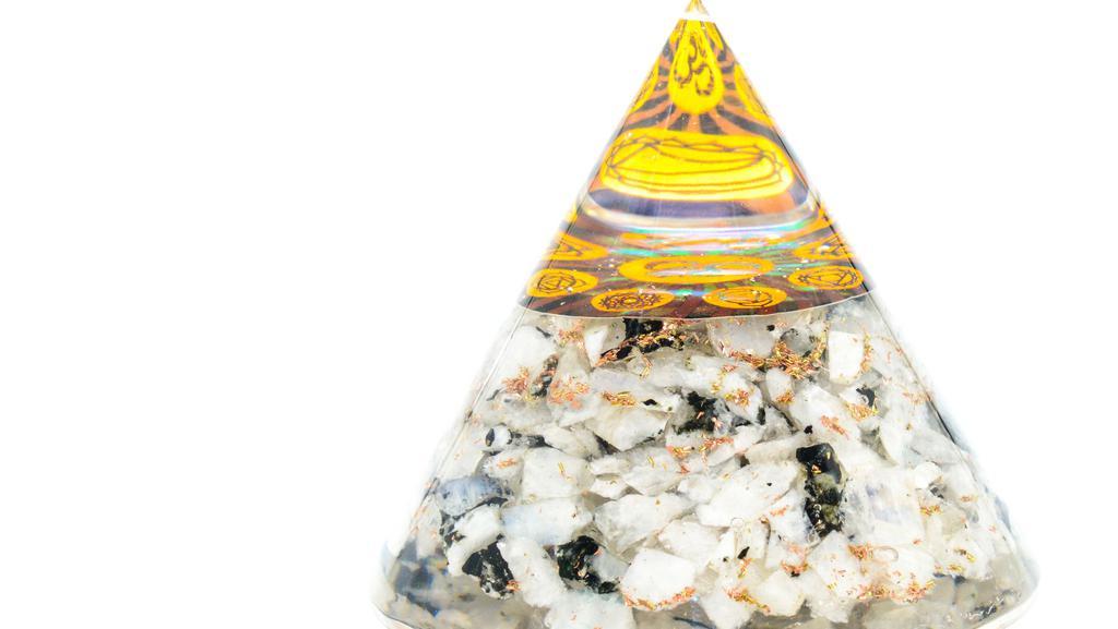 Moonstone Orgone Pyramid · Moonstone pieces in acrylic orgone pyramid with chakra disk.
