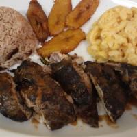 Jerk Chicken · This Jamaican jerk chicken is marinated and rubbed with authentic jerk seasonings and transp...