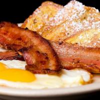 Bacon French Toast · Sliced fresh bread soaked in eggs and milk, then fried, served with side of crispy bacon, bu...