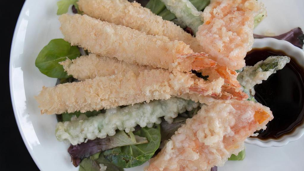 Shrimp And Vegetable Tempura · Lightly battered and deep fried served with homemade tempura or sweet chili sauce.
