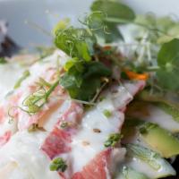 Avocado Crab Salad · Alaskan king crab and slices of avocado served over mixed greens and topped with miso wasabi...