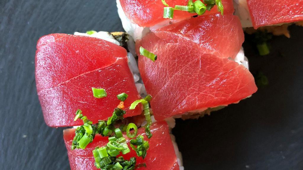 Spicy Tuna Maki Roll · Spicy. Chopped tuna, cucumber, spicy mayo, masago and scallion, topped with tuna.