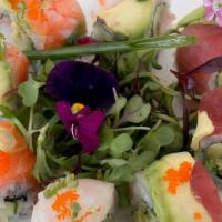 Rainbow Maki Roll · California roll topped with tuna, salmon, white fish, shrimp, avocado, scallion and masago.