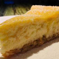 Key Lime Cheesecake · Tropical and tart key lime cheesecake with a coconut crust.