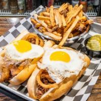 Breakfast Cheesesteak · Beef cheesesteak & fried onions, topped with fried egg