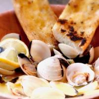 Bowl Of Clams · Littleneck clams in a garlic, white wine broth, served with garlic bread.