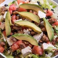 Avocado Salad · Creamy fresh avocado slices top this flavorful and nutritious salad made of grilled chicken,...