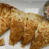 Grilled Chicken Quesadilla · Grilled chicken, onion, pepper, melted Pepper Jack cheese topped with ranch dressing.