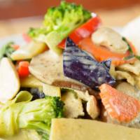 Green Curry · Simmered in coconut milk with bamboo shoot, fresh basil and eggplant.