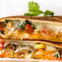 Veggie Quesadilla · Cheese, onions, red peppers, green peppers.. Side of sour cream and pico de gallo.