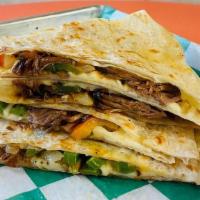 Barbacoa Quesadilla · Shredded spicy beef, includes: green peppers, red peppers and onions.