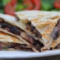 Wild Mushrooms Quesadilla · Cheese, onions, red peppers, green peppers.. Side of sour cream and pico de gallo.
