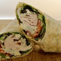 Chicken Sriracha Wrap · Grilled chicken breast, sriracha crème, mixed greens, celery, tomatoes and crumbled blue che...