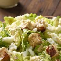Caesar Salad · Grilled chicken over romaine lettuce parmesan cheese with caesar dressing and croutons.