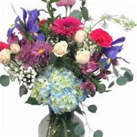 Endless Love Fg222 · This traditional design in a vase has beautiful flowers in colors of spring. It include both...